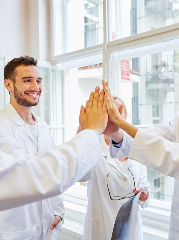 nurses high-fiving